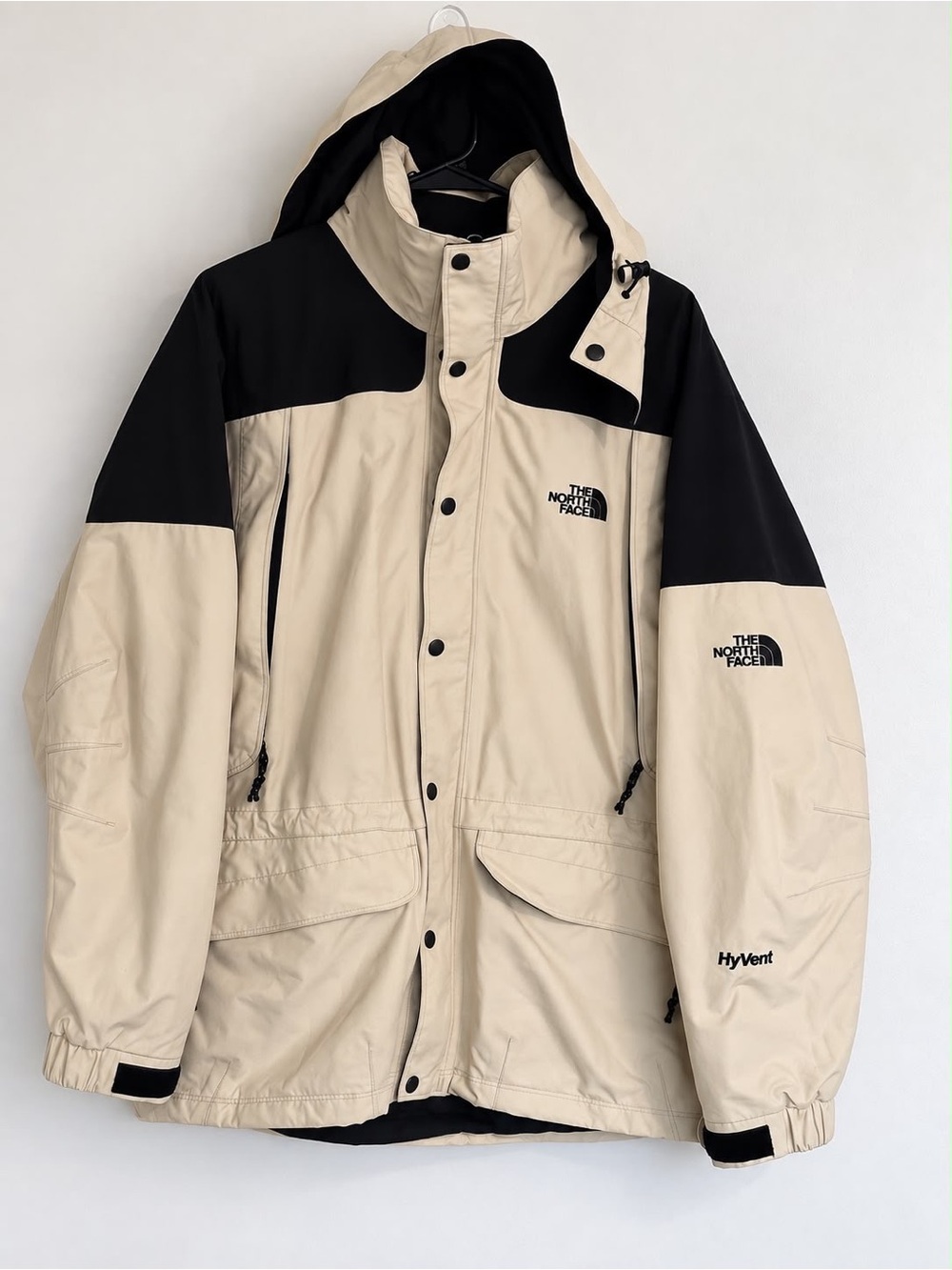 The North Face Beige and Black Hooded Rain Jacket